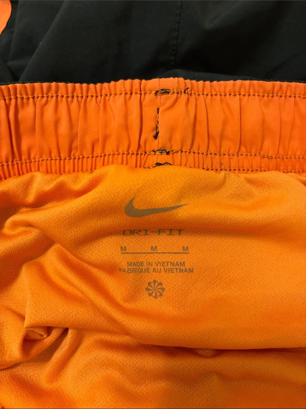 Nike Women’s Black Running Shorts with Orange Trim